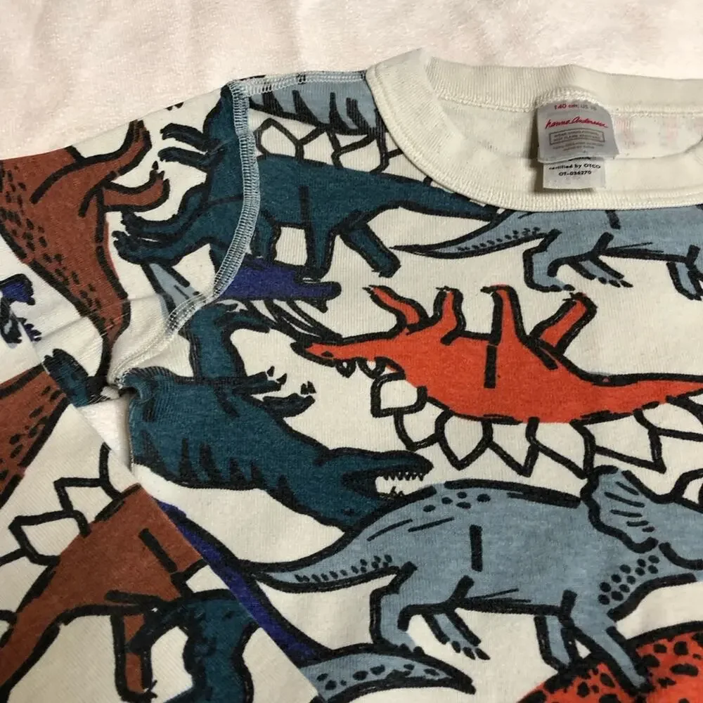 Hanna Andersson off white multicolor dinosaur pajamas size 140 or US 10